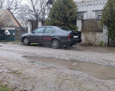 Серый Ниссан Примера, объемом двигателя 2 л и пробегом 340 тыс. км за 800 $, фото 1 на Automoto.ua