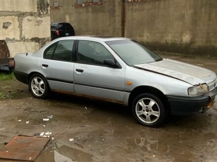 Серый Ниссан Примера, объемом двигателя 2 л и пробегом 200 тыс. км за 700 $, фото 1 на Automoto.ua