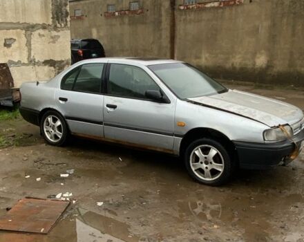 Серый Ниссан Примера, объемом двигателя 2 л и пробегом 200 тыс. км за 700 $, фото 1 на Automoto.ua