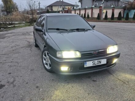 Серый Ниссан Примера, объемом двигателя 2 л и пробегом 400 тыс. км за 1550 $, фото 1 на Automoto.ua