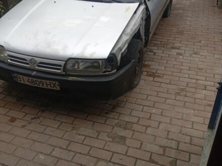 Серый Ниссан Примера, объемом двигателя 2 л и пробегом 350 тыс. км за 709 $, фото 1 на Automoto.ua