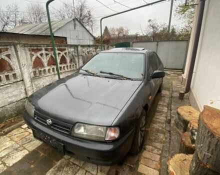 Серый Ниссан Примера, объемом двигателя 2 л и пробегом 198 тыс. км за 476 $, фото 1 на Automoto.ua