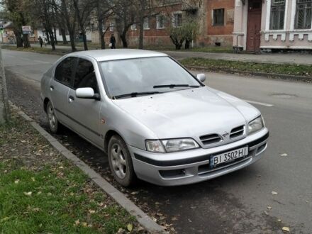 Серый Ниссан Примера, объемом двигателя 2 л и пробегом 350 тыс. км за 2000 $, фото 1 на Automoto.ua