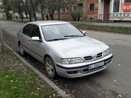 Серый Ниссан Примера, объемом двигателя 2 л и пробегом 350 тыс. км за 2000 $, фото 1 на Automoto.ua