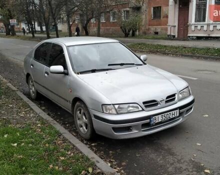 Сірий Ніссан Прімера, об'ємом двигуна 2 л та пробігом 350 тис. км за 2000 $, фото 1 на Automoto.ua