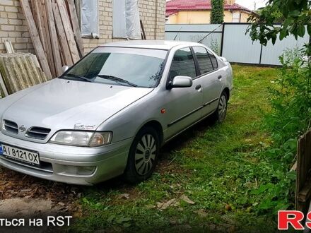 Серый Ниссан Примера, объемом двигателя 2 л и пробегом 350 тыс. км за 2500 $, фото 1 на Automoto.ua