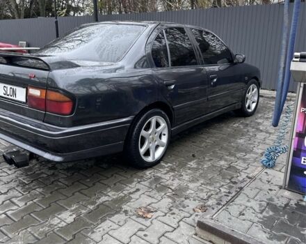 Сірий Ніссан Прімера, об'ємом двигуна 2 л та пробігом 240 тис. км за 2400 $, фото 1 на Automoto.ua