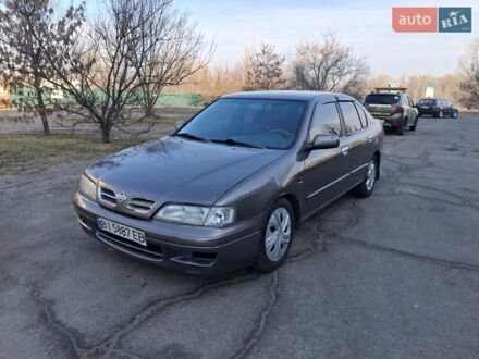 Ниссан Примера 1998 в Кременчуге на Automoto.ua Серый Ниссан Примера, объемом двигателя 2 л и пробегом 250 тыс. км за 2300 $, фото 1 на Automoto.ua
