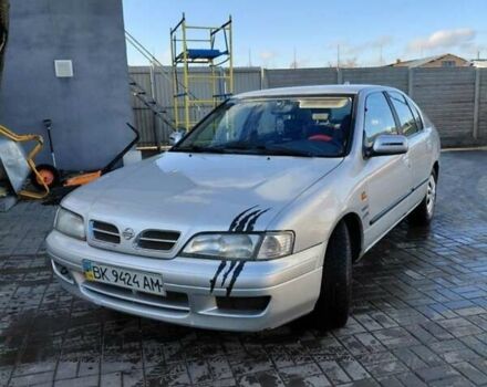 Серый Ниссан Примера, объемом двигателя 2.02 л и пробегом 250 тыс. км за 2500 $, фото 1 на Automoto.ua