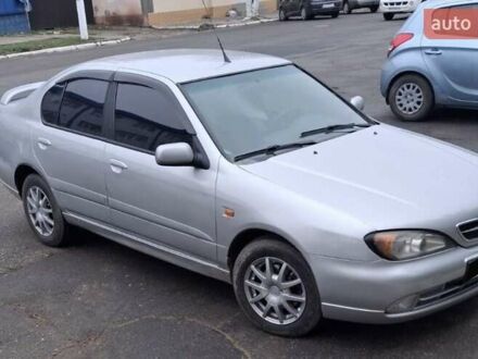 Серый Ниссан Примера, объемом двигателя 1.6 л и пробегом 208 тыс. км за 3500 $, фото 1 на Automoto.ua