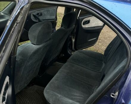 Синий Ниссан Примера, объемом двигателя 2 л и пробегом 355 тыс. км за 1350 $, фото 17 на Automoto.ua