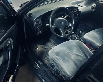 Синій Ніссан Прімера, об'ємом двигуна 2 л та пробігом 250 тис. км за 550 $, фото 4 на Automoto.ua