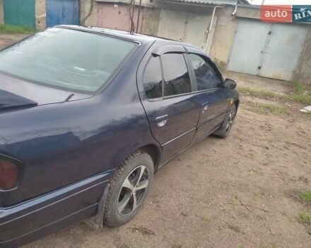 Синий Ниссан Примера, объемом двигателя 2 л и пробегом 362 тыс. км за 1700 $, фото 2 на Automoto.ua