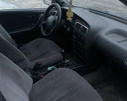 Синий Ниссан Примера, объемом двигателя 2 л и пробегом 300 тыс. км за 1900 $, фото 4 на Automoto.ua