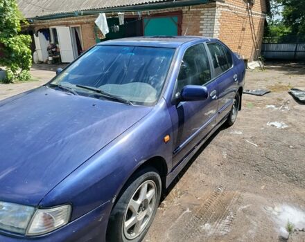 Синий Ниссан Примера, объемом двигателя 2 л и пробегом 300 тыс. км за 1800 $, фото 2 на Automoto.ua