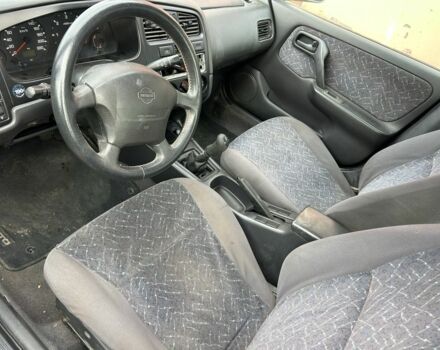 Синій Ніссан Прімера, об'ємом двигуна 2 л та пробігом 200 тис. км за 1000 $, фото 5 на Automoto.ua