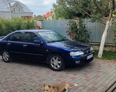 Синий Ниссан Примера, объемом двигателя 2 л и пробегом 276 тыс. км за 2400 $, фото 2 на Automoto.ua