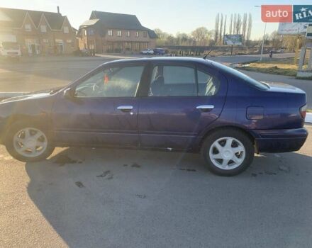 Синій Ніссан Прімера, об'ємом двигуна 2 л та пробігом 400 тис. км за 1600 $, фото 7 на Automoto.ua