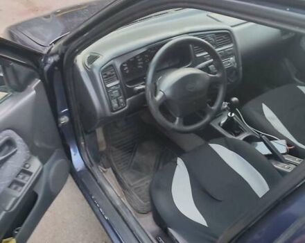 Синій Ніссан Прімера, об'ємом двигуна 2 л та пробігом 400 тис. км за 2200 $, фото 4 на Automoto.ua