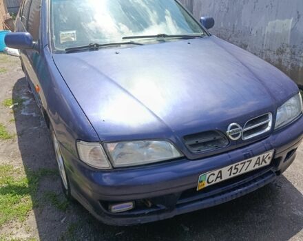 Синий Ниссан Примера, объемом двигателя 2 л и пробегом 300 тыс. км за 1800 $, фото 1 на Automoto.ua