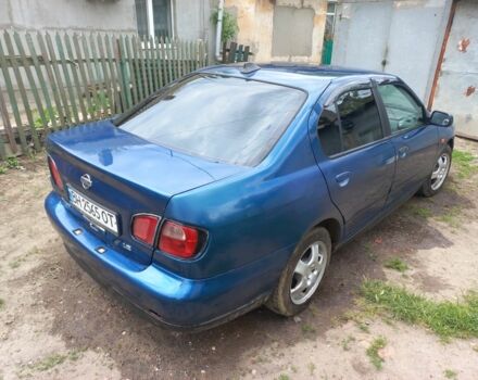 Синій Ніссан Прімера, об'ємом двигуна 1.8 л та пробігом 300 тис. км за 2600 $, фото 4 на Automoto.ua