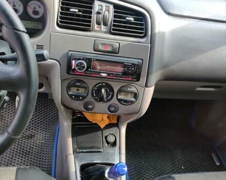 Синий Ниссан Примера, объемом двигателя 1.8 л и пробегом 256 тыс. км за 3750 $, фото 6 на Automoto.ua