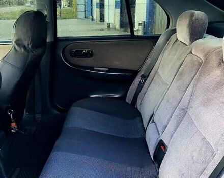 Синий Ниссан Примера, объемом двигателя 1.6 л и пробегом 316 тыс. км за 2000 $, фото 6 на Automoto.ua