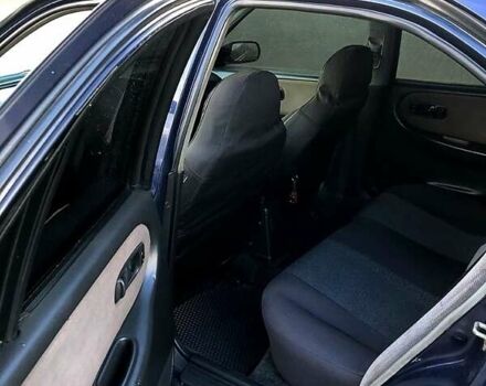 Синий Ниссан Примера, объемом двигателя 1.6 л и пробегом 316 тыс. км за 2000 $, фото 5 на Automoto.ua