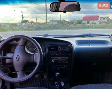 Синий Ниссан Примера, объемом двигателя 1.6 л и пробегом 316 тыс. км за 2000 $, фото 4 на Automoto.ua