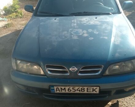 Синий Ниссан Примера, объемом двигателя 1.6 л и пробегом 390 тыс. км за 1000 $, фото 2 на Automoto.ua
