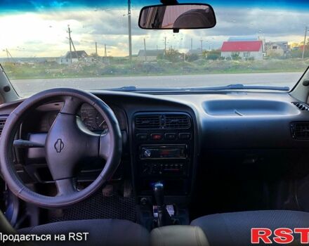 Синий Ниссан Примера, объемом двигателя 1.6 л и пробегом 316 тыс. км за 2000 $, фото 5 на Automoto.ua