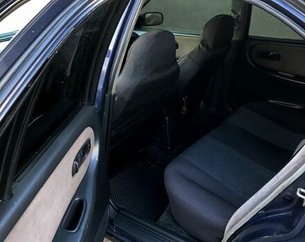 Синий Ниссан Примера, объемом двигателя 1.6 л и пробегом 316 тыс. км за 2000 $, фото 6 на Automoto.ua