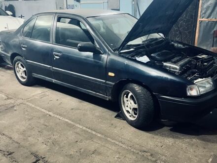 Синий Ниссан Примера, объемом двигателя 2 л и пробегом 250 тыс. км за 550 $, фото 1 на Automoto.ua