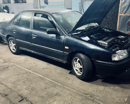 Синий Ниссан Примера, объемом двигателя 2 л и пробегом 250 тыс. км за 550 $, фото 1 на Automoto.ua