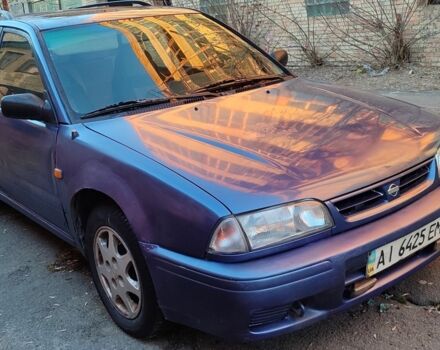 Синий Ниссан Примера, объемом двигателя 2 л и пробегом 400 тыс. км за 1500 $, фото 1 на Automoto.ua
