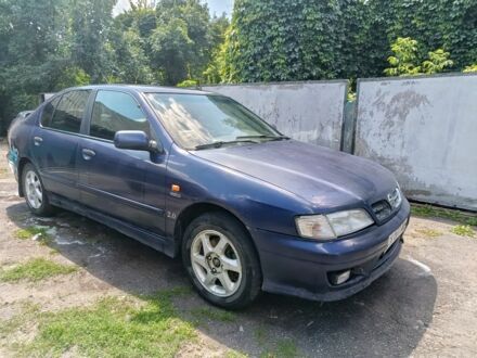 Синій Ніссан Прімера, об'ємом двигуна 2 л та пробігом 300 тис. км за 1800 $, фото 1 на Automoto.ua