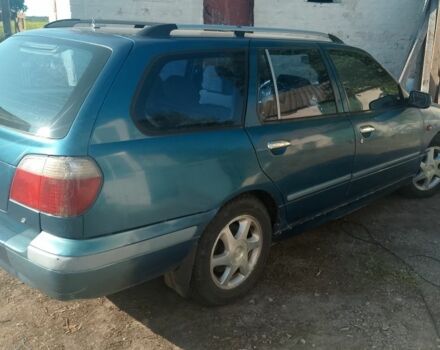 Синий Ниссан Примера, объемом двигателя 1.6 л и пробегом 390 тыс. км за 1000 $, фото 1 на Automoto.ua