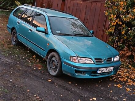 Синій Ніссан Прімера, об'ємом двигуна 1.6 л та пробігом 223 тис. км за 719 $, фото 1 на Automoto.ua