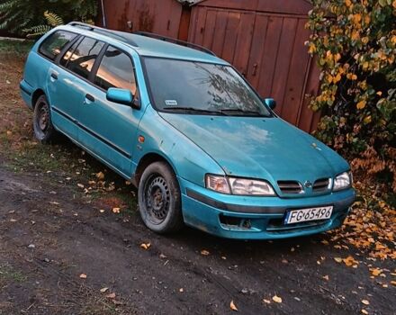 Синій Ніссан Прімера, об'ємом двигуна 1.6 л та пробігом 223 тис. км за 719 $, фото 1 на Automoto.ua