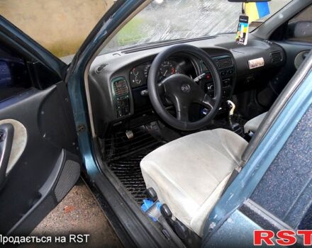 Зеленый Ниссан Примера, объемом двигателя 1.6 л и пробегом 285 тыс. км за 2000 $, фото 4 на Automoto.ua