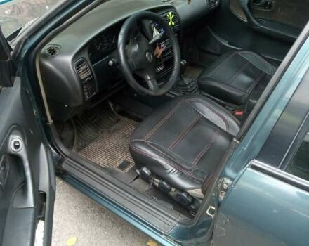 Зелений Ніссан Прімера, об'ємом двигуна 1.6 л та пробігом 416 тис. км за 2000 $, фото 3 на Automoto.ua