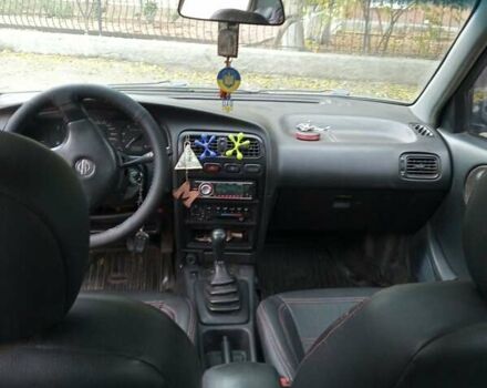 Зелений Ніссан Прімера, об'ємом двигуна 1.6 л та пробігом 416 тис. км за 2000 $, фото 8 на Automoto.ua