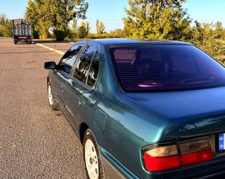 Зелений Ніссан Прімера, об'ємом двигуна 1.6 л та пробігом 405 тис. км за 2000 $, фото 1 на Automoto.ua