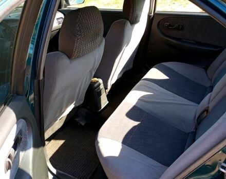 Зелений Ніссан Прімера, об'ємом двигуна 1.6 л та пробігом 400 тис. км за 1400 $, фото 4 на Automoto.ua