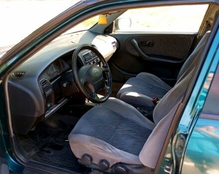 Зелений Ніссан Прімера, об'ємом двигуна 1.6 л та пробігом 400 тис. км за 1400 $, фото 3 на Automoto.ua