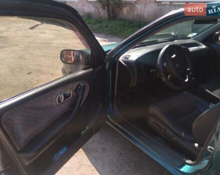 Зеленый Ниссан Примера, объемом двигателя 2 л и пробегом 163 тыс. км за 2700 $, фото 2 на Automoto.ua