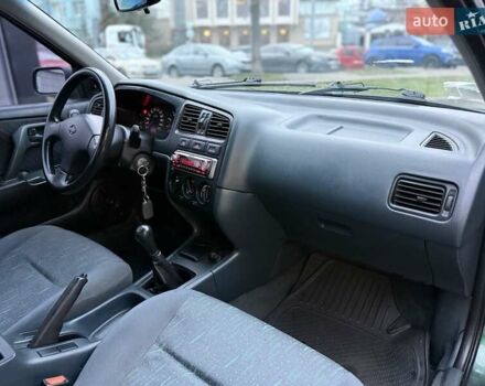 Зелений Ніссан Прімера, об'ємом двигуна 1.6 л та пробігом 280 тис. км за 2999 $, фото 11 на Automoto.ua