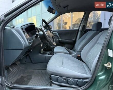 Зелений Ніссан Прімера, об'ємом двигуна 1.6 л та пробігом 280 тис. км за 2999 $, фото 15 на Automoto.ua