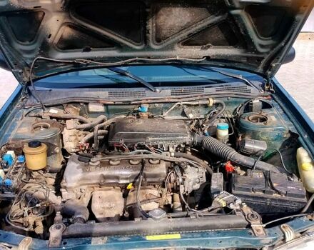 Зеленый Ниссан Примера, объемом двигателя 1.6 л и пробегом 45 тыс. км за 1000 $, фото 1 на Automoto.ua