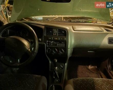 Зелений Ніссан Прімера, об'ємом двигуна 2 л та пробігом 301 тис. км за 1800 $, фото 4 на Automoto.ua